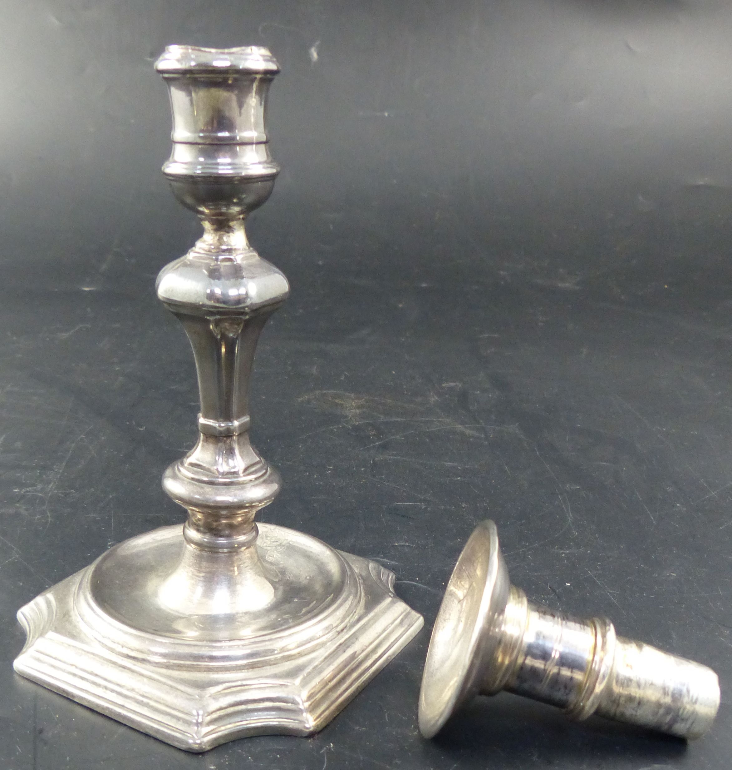 A George II cast silver candlestick by Abraham Buteux, London, circa, 1725, 14.7cm, 11oz.